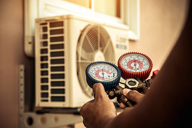 Professional Air Conditioning Service technician working in Oakdale, MN